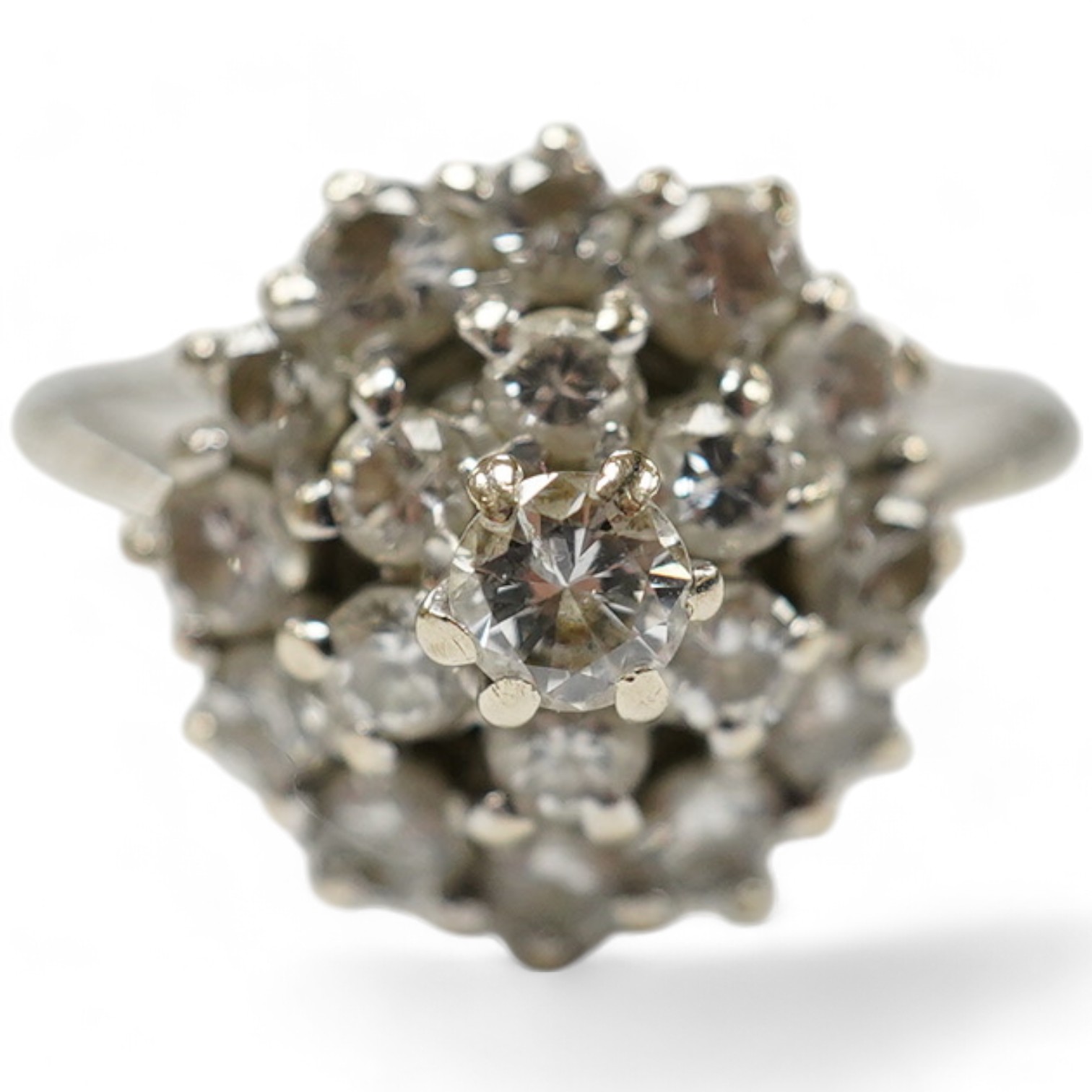 A 1970's 18ct white gold and diamond cluster set ring, size L, gross weight 3.2 grams, Condition - fair to good